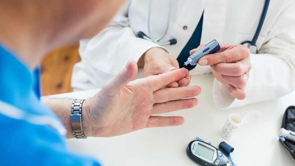 doctor take blood for sugar in diabetes